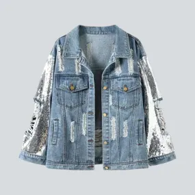 Fully distressed women's denim jacket